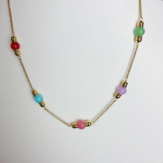 Collana “Sfumature di Gioia” – Un’Armonia di Forme e Ritmo Elegante