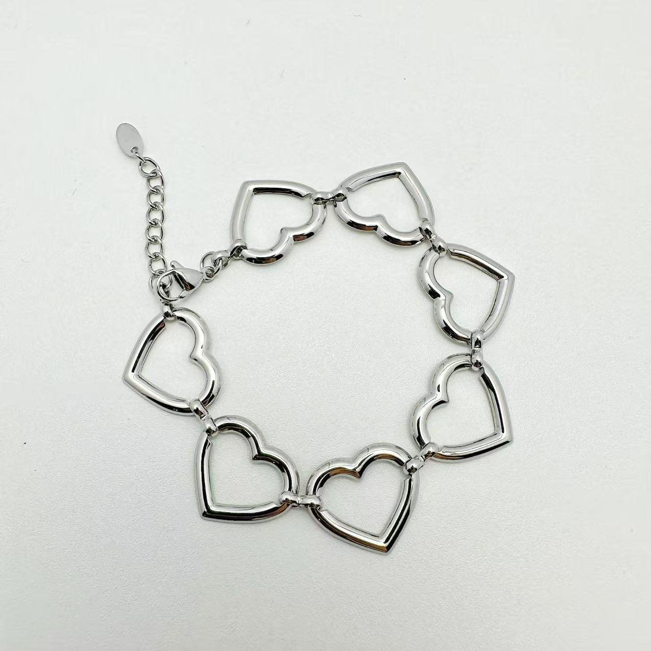 (B157)Bracciale cuoricini in acciaio inox