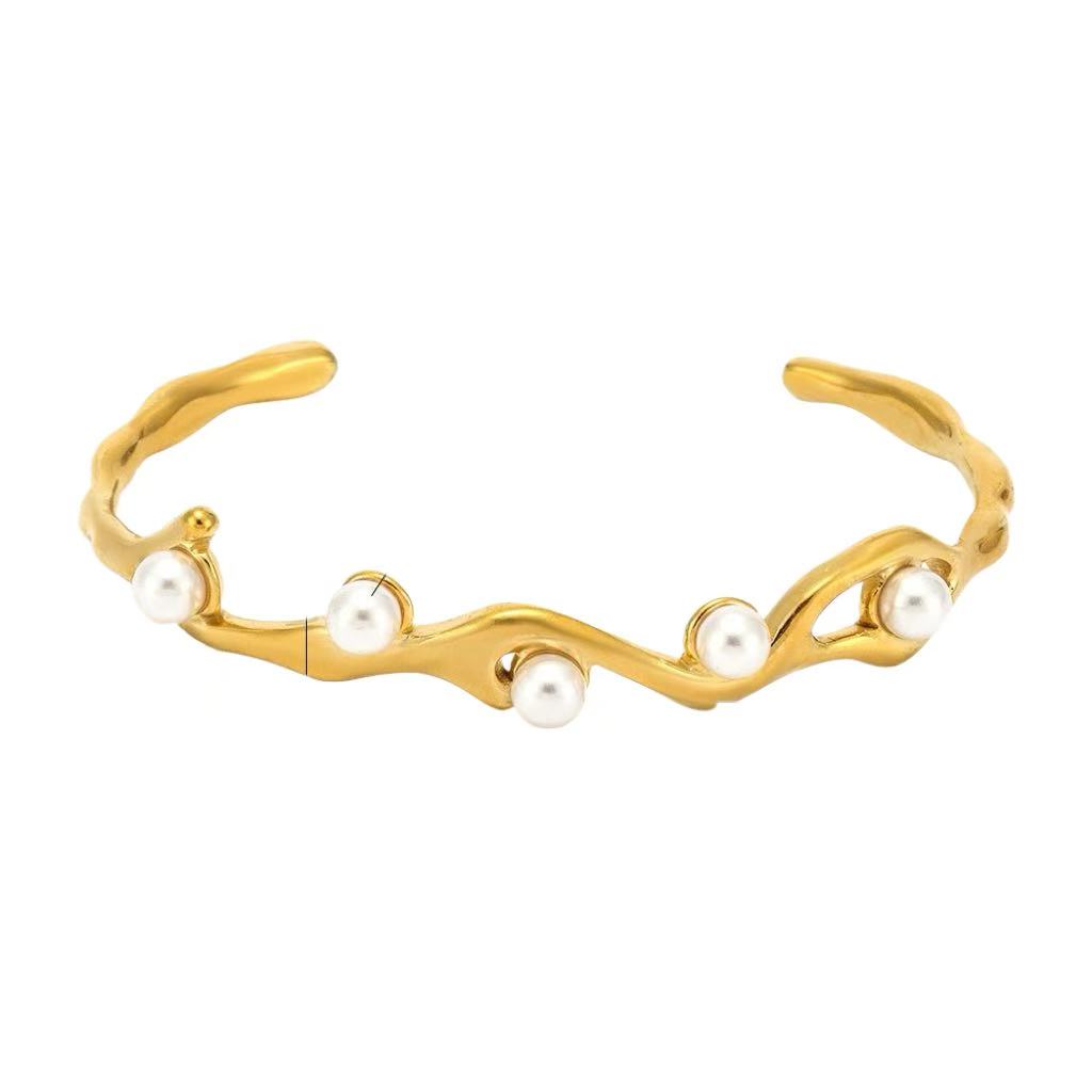 Bracciale aperto con perle decorative