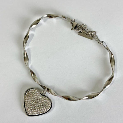 Bracciale “Battito del Cuore” – Eleganza Intrecciata con Charme