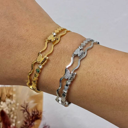 Bracciale rigido farfalle con la chiusura a molla