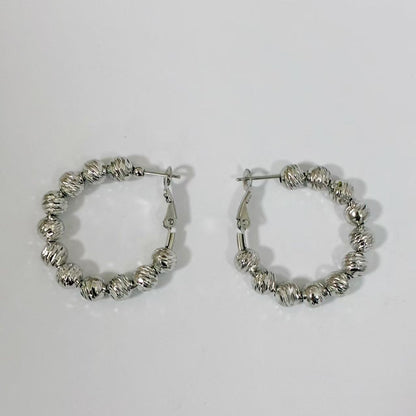 Orecchini “Cerchi Perla d’Acciaio”