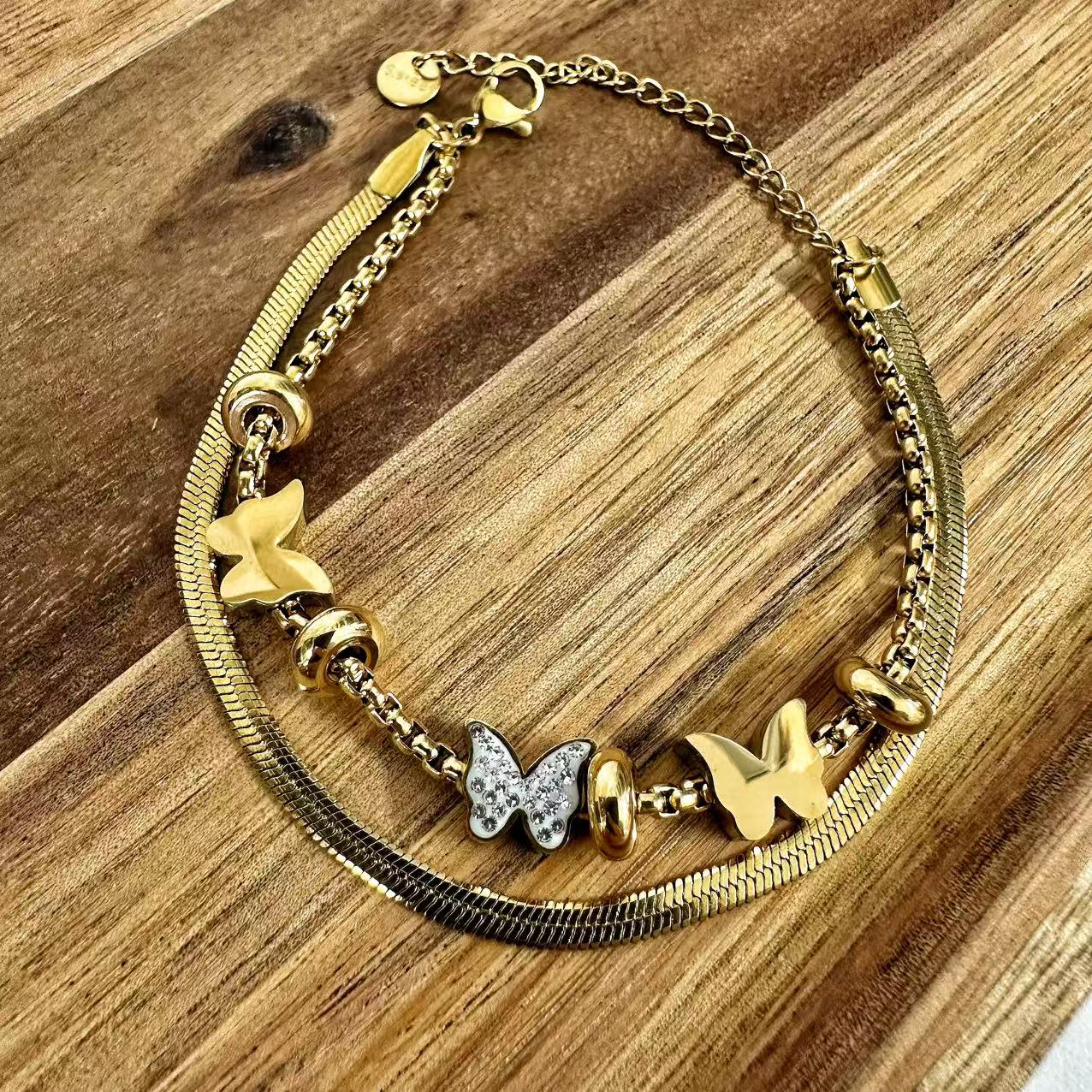 (B061) BRACCIALE DONNA CON FARFALLE DOPPIO FILO IN ACCIAIO INOX