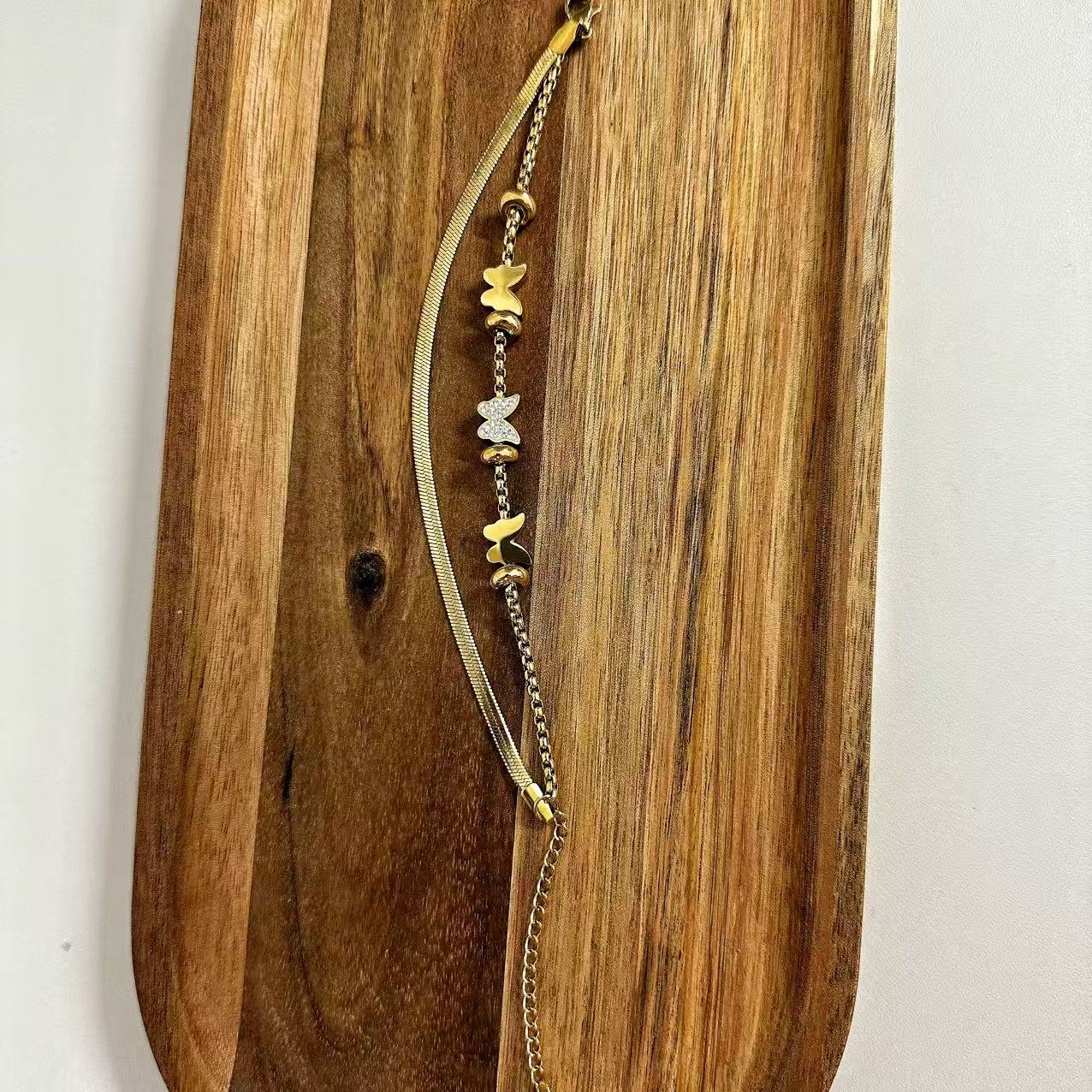 (B061) BRACCIALE DONNA CON FARFALLE DOPPIO FILO IN ACCIAIO INOX