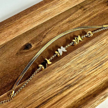 (B061) BRACCIALE DONNA CON FARFALLE DOPPIO FILO IN ACCIAIO INOX