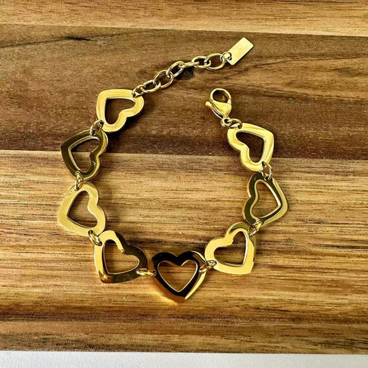 (B064) BRACCIALE DONNA CON CUORI IN ACCIAIO INOX