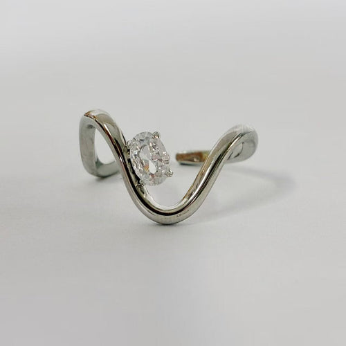 Anello “Onda di Luce” con zircone ovale  | regolabile | in acciaio inox