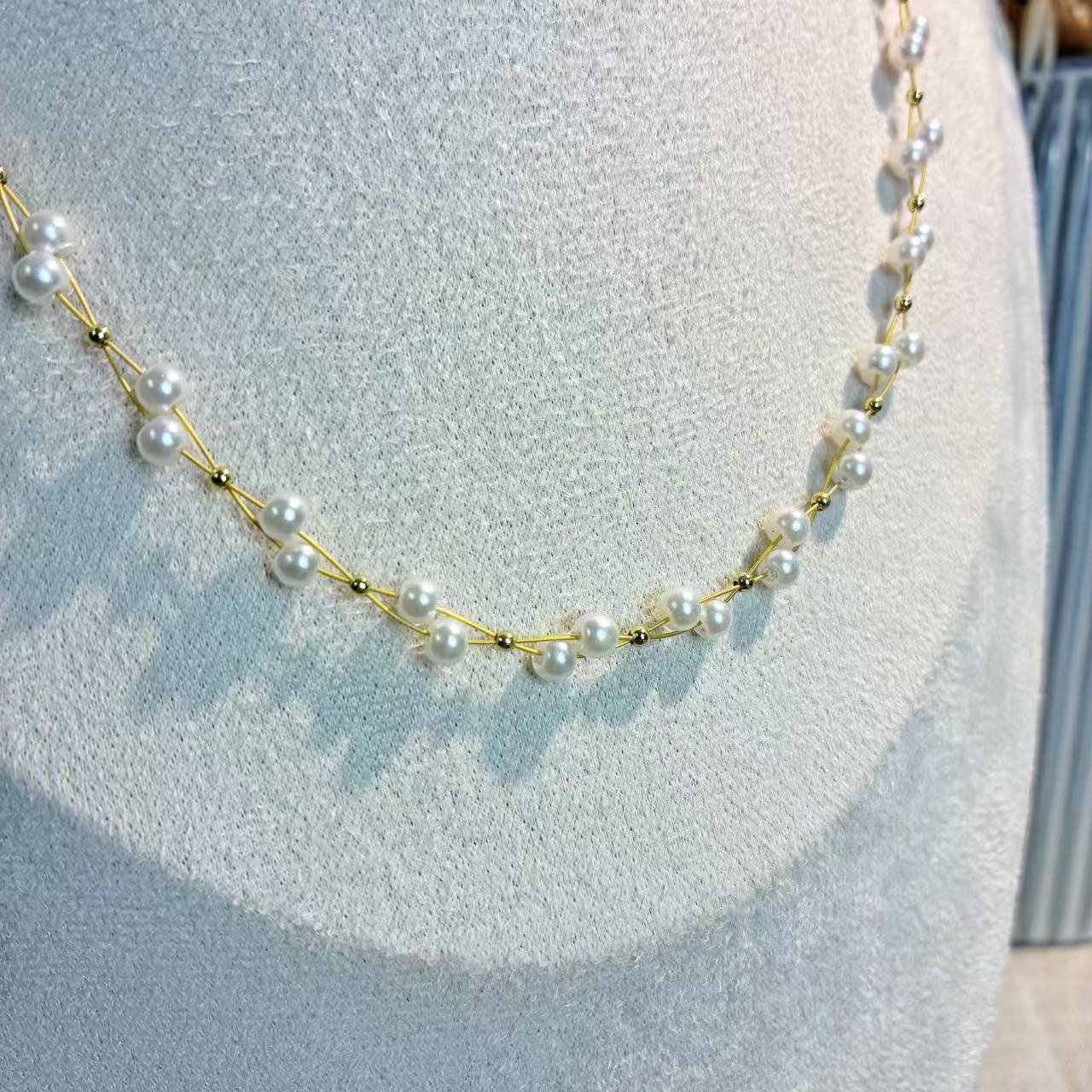 Collana “Perla Doppia” – Eleganza intrecciata