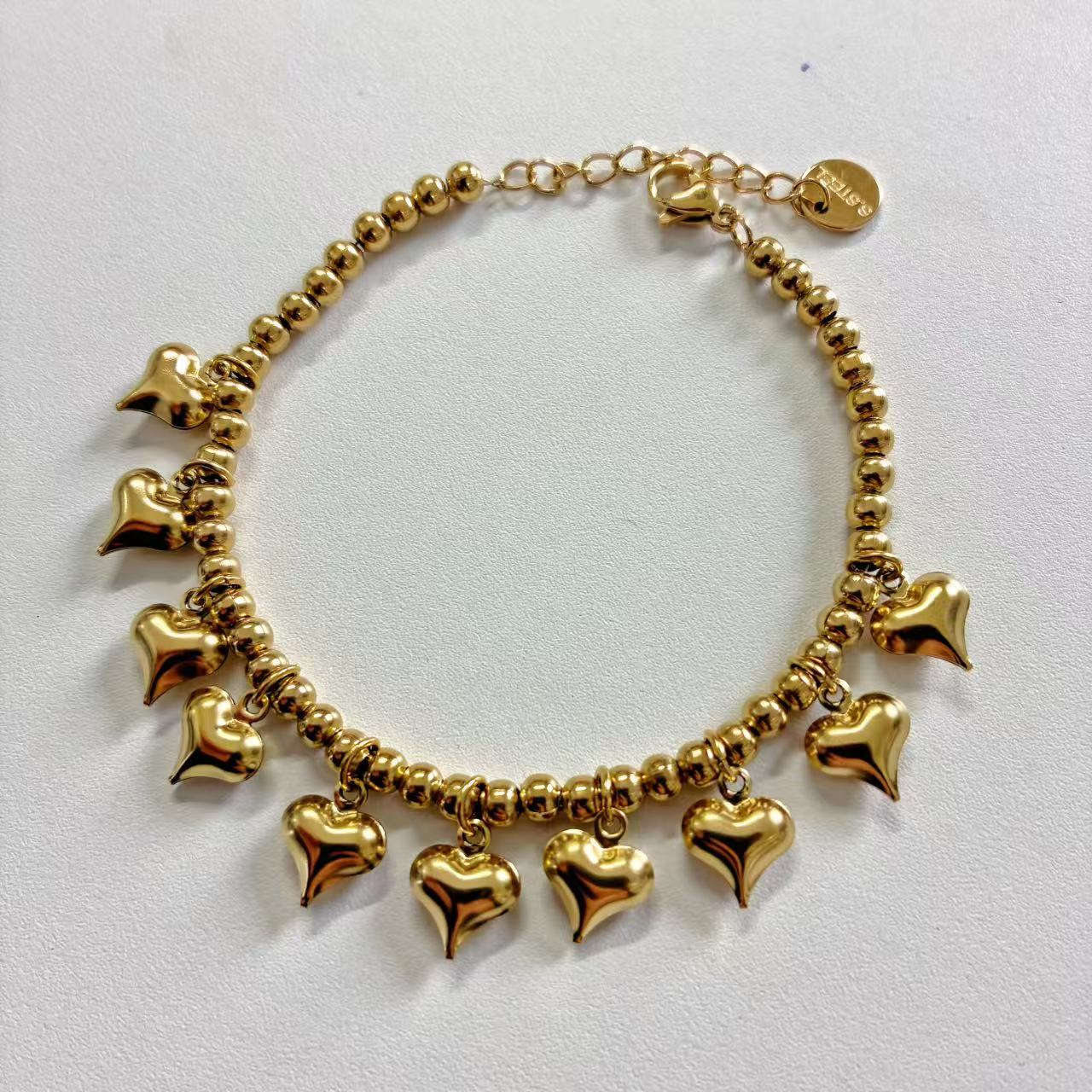 Bracciale “Cuori Danzanti” – Dolcezza in Movimento e Brillantezza Senza Tempo