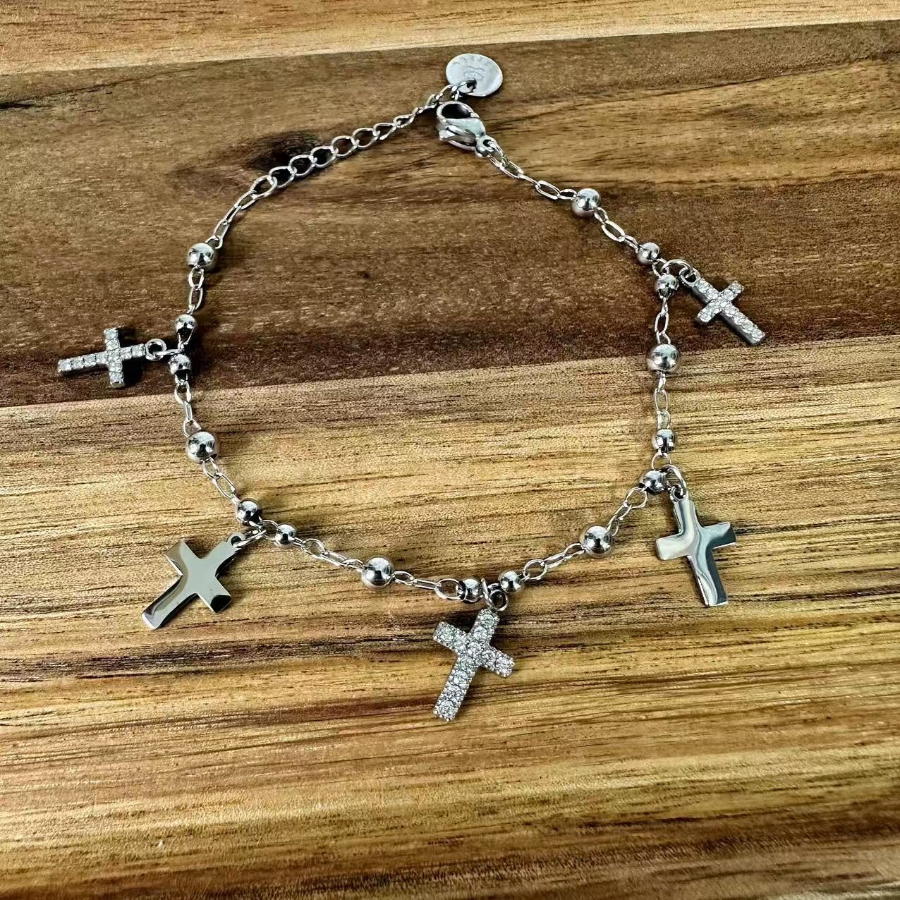 (B067) BRACCIALE DONNA CON PENDENTI CROCI IN ACCIAIO INOX