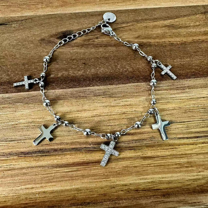 (B067) BRACCIALE DONNA CON PENDENTI CROCI IN ACCIAIO INOX