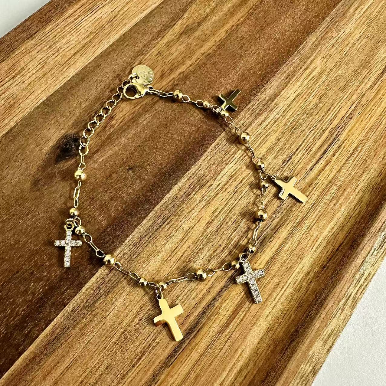 (B067) BRACCIALE DONNA CON PENDENTI CROCI IN ACCIAIO INOX