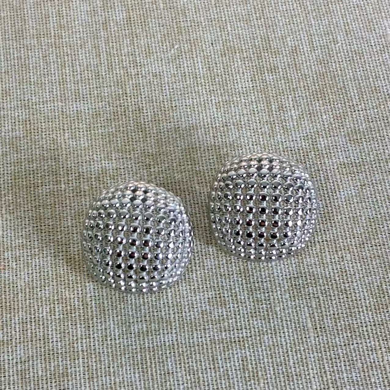 Orecchini “Forma” – La calma della forza