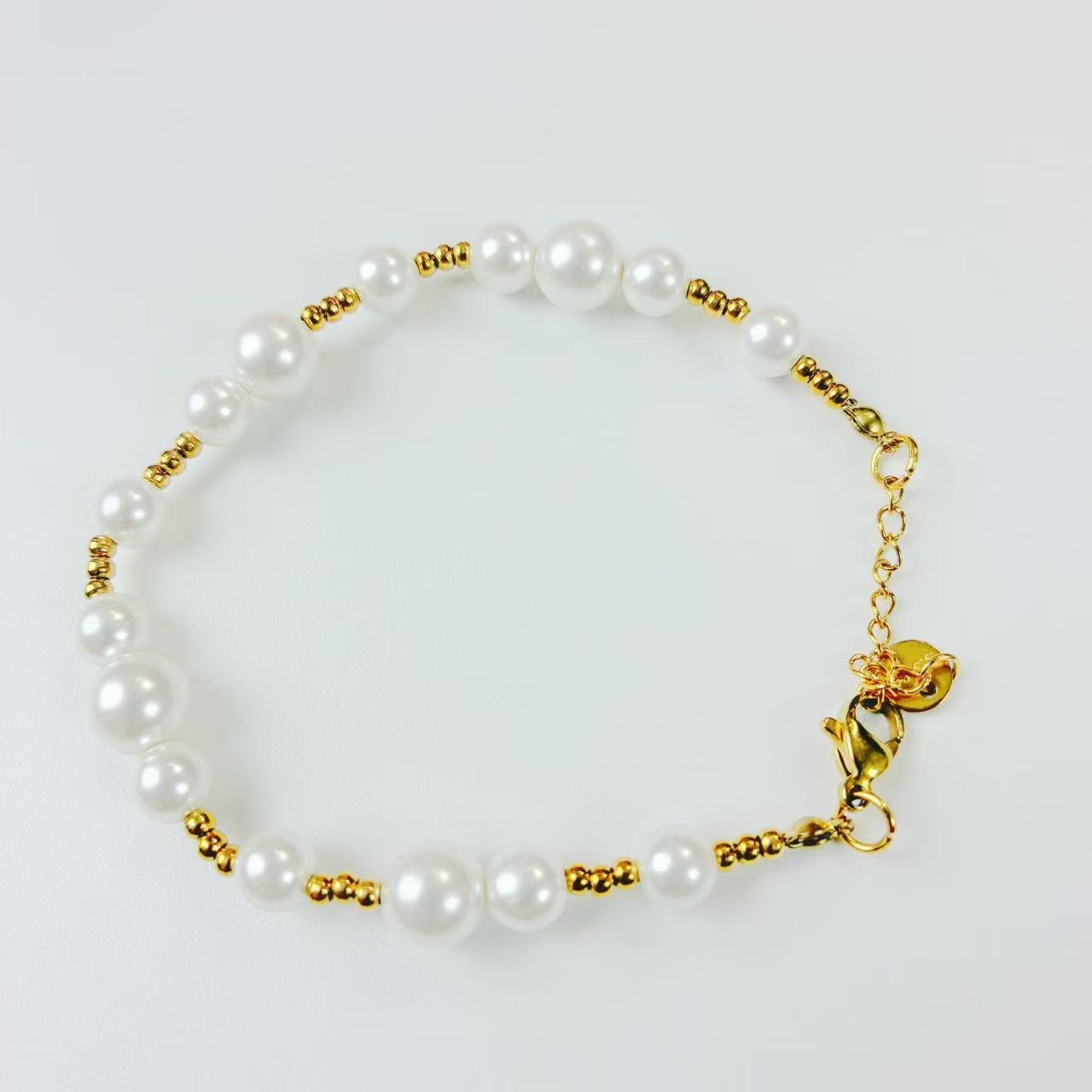 Bracciali vari con perlini