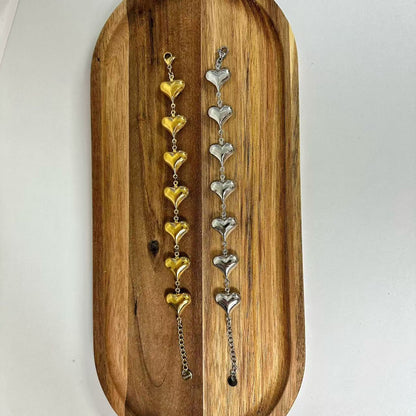 （B069) BRACCIALE DONNA CON CUORI IN ACCIAIO INOX