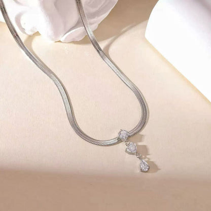 Collana "Serpente di Luce" – Girocollo con Pendente Trilogy