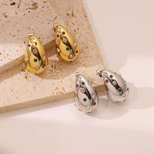 Orecchini "Goccia Arcobaleno" – Sculture di Luce in Acciaio