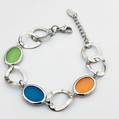 Bracciale con Maglie Dorate & Elementi Colorati – Stile Chic e Vivace