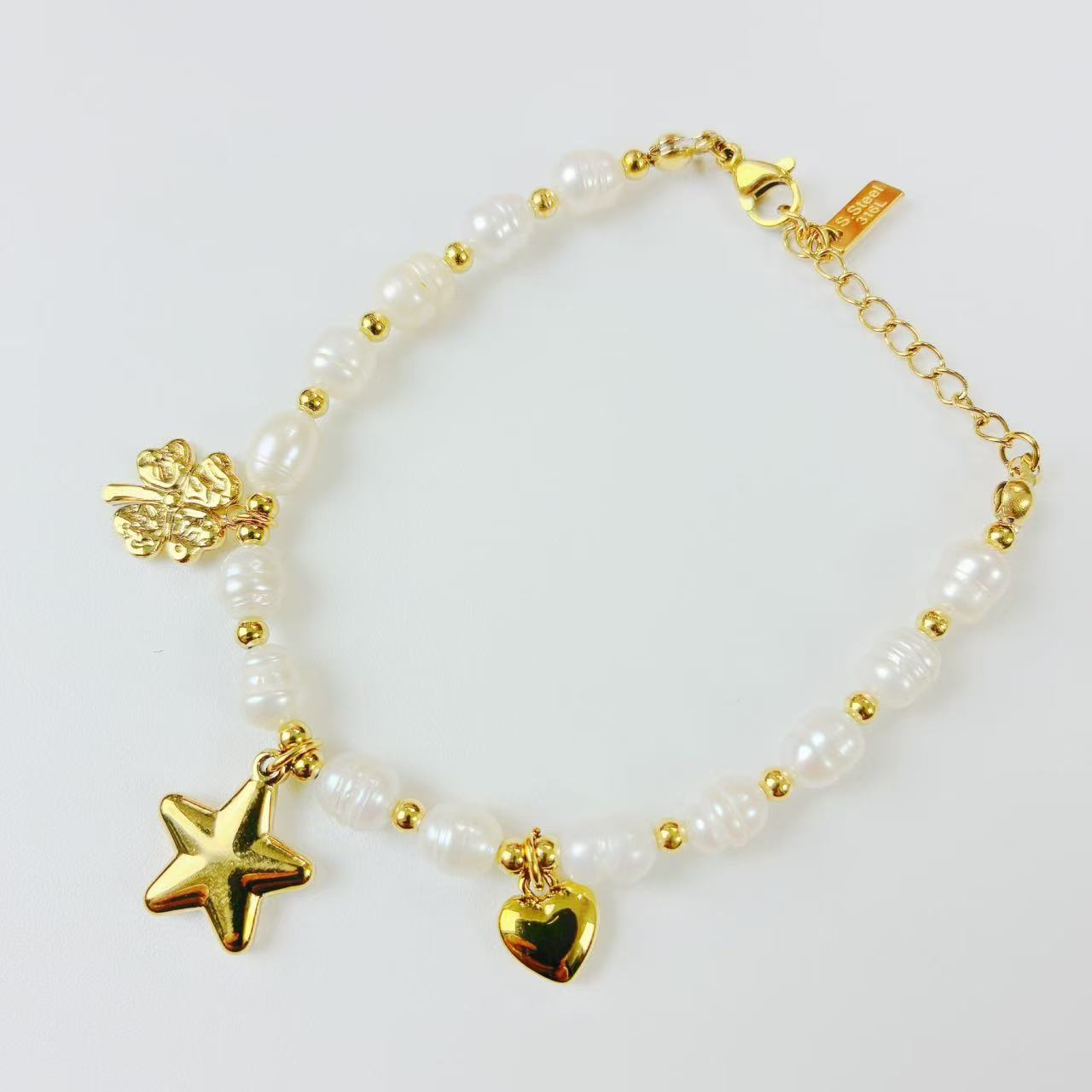 Bracciali vari con perlini