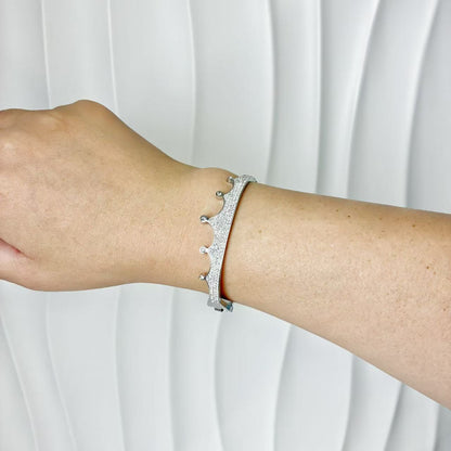 (B140)Bracciale rigido corona pave’ con molla in acciaio inox