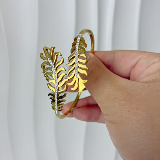 (B146)Bracciale rigido donna con molla foglie in acciaio inox