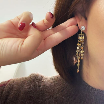 Orecchini “Cascata di Luce Dorata” – Eleganza che Scintilla ad Ogni Movimento