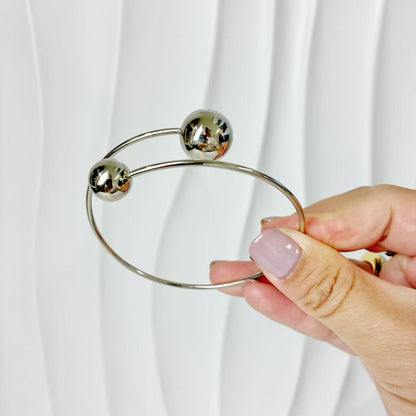 (B149)Bracciale semirigido donna con palline in acciaio inox