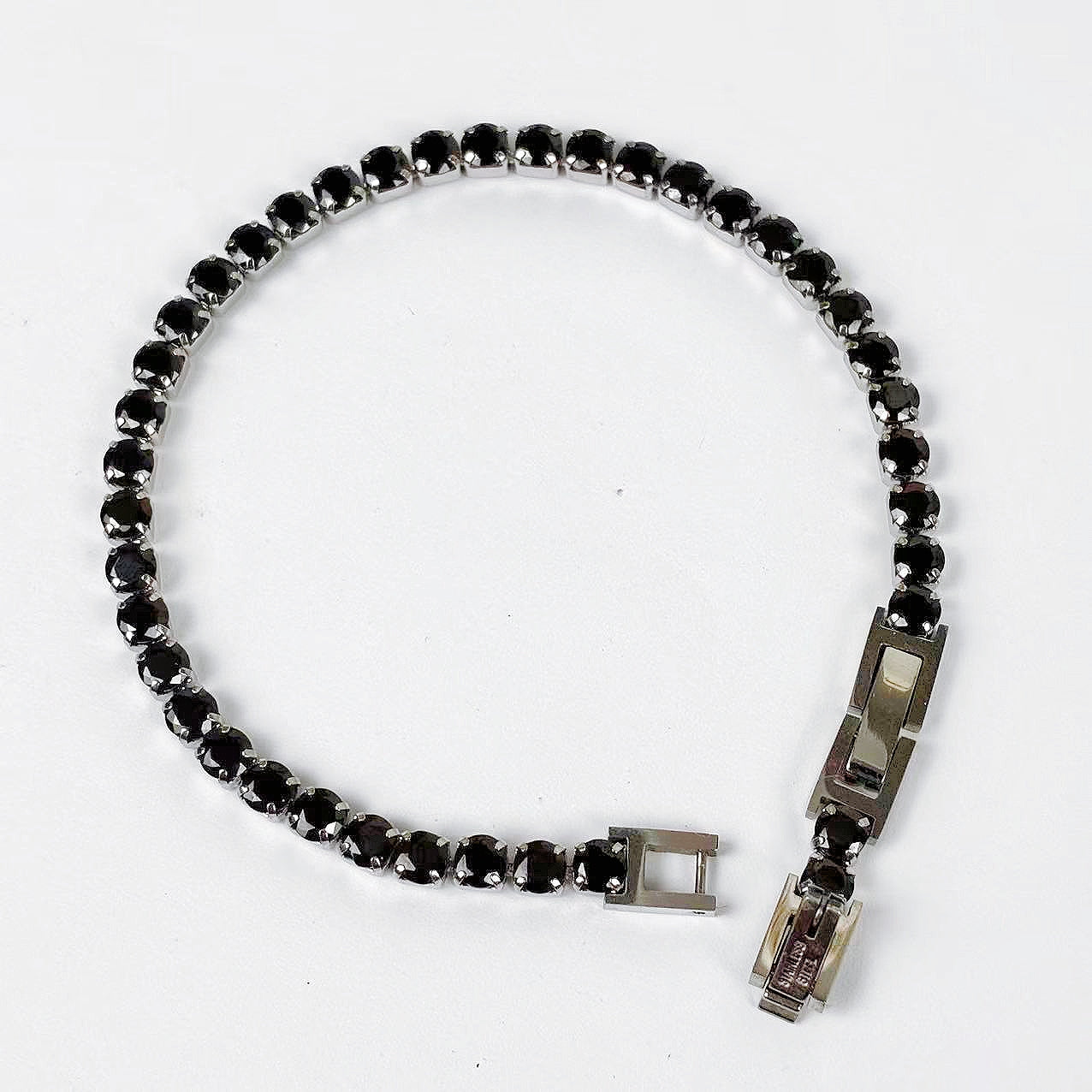 Bracciale “Filo di Energia” – Sequenza Brillante dal Segno Deciso