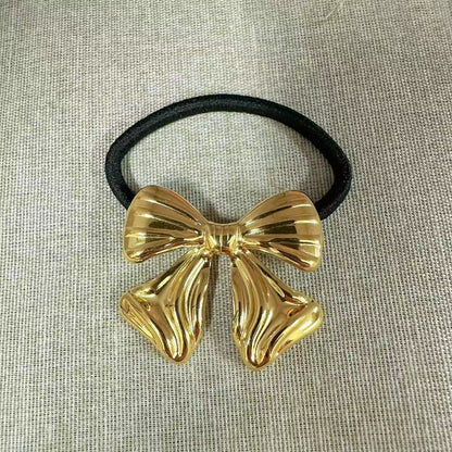 Elastico per capelli con fiocco scultoreo