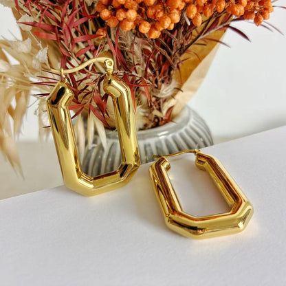 Orecchini “Forma di Luce” – Geometria Dorata in Acciaio Inossidabile