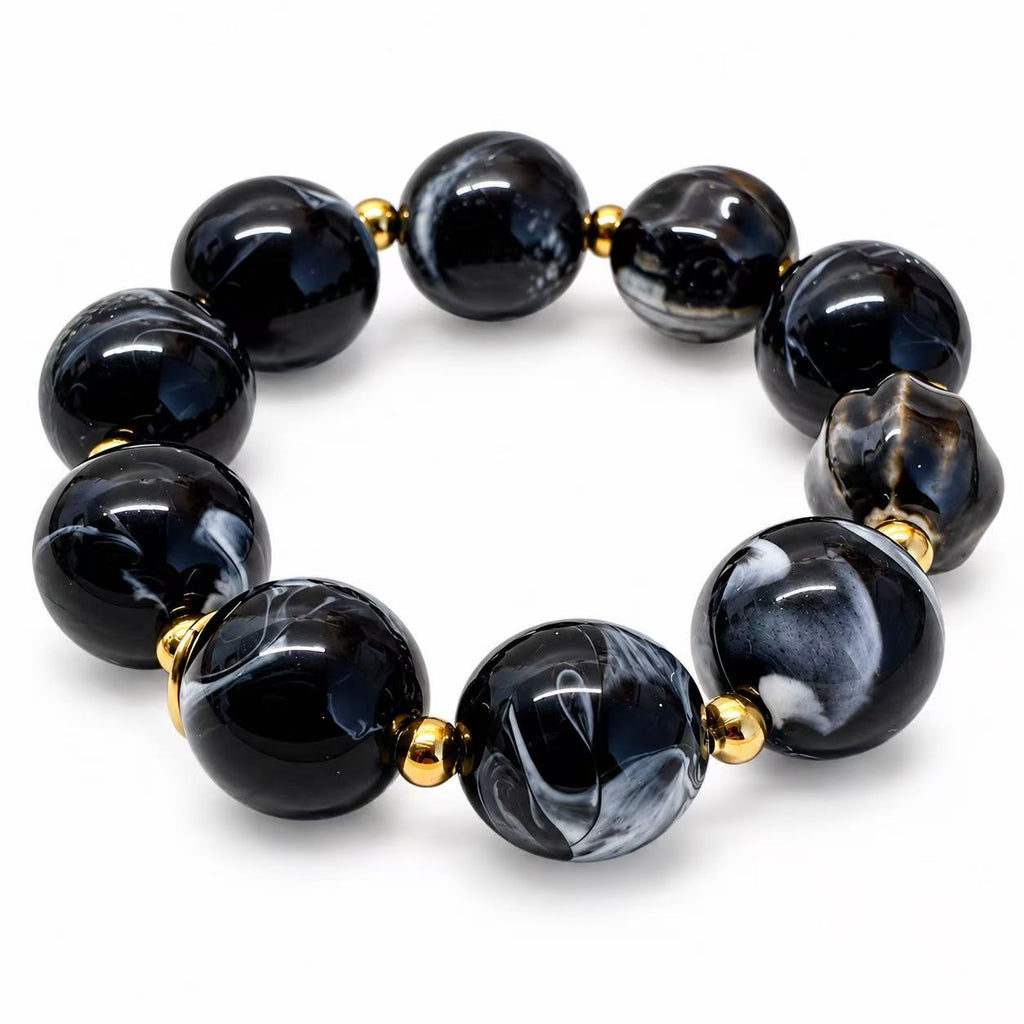 Bracciale elastico con pepite in acciaio inox