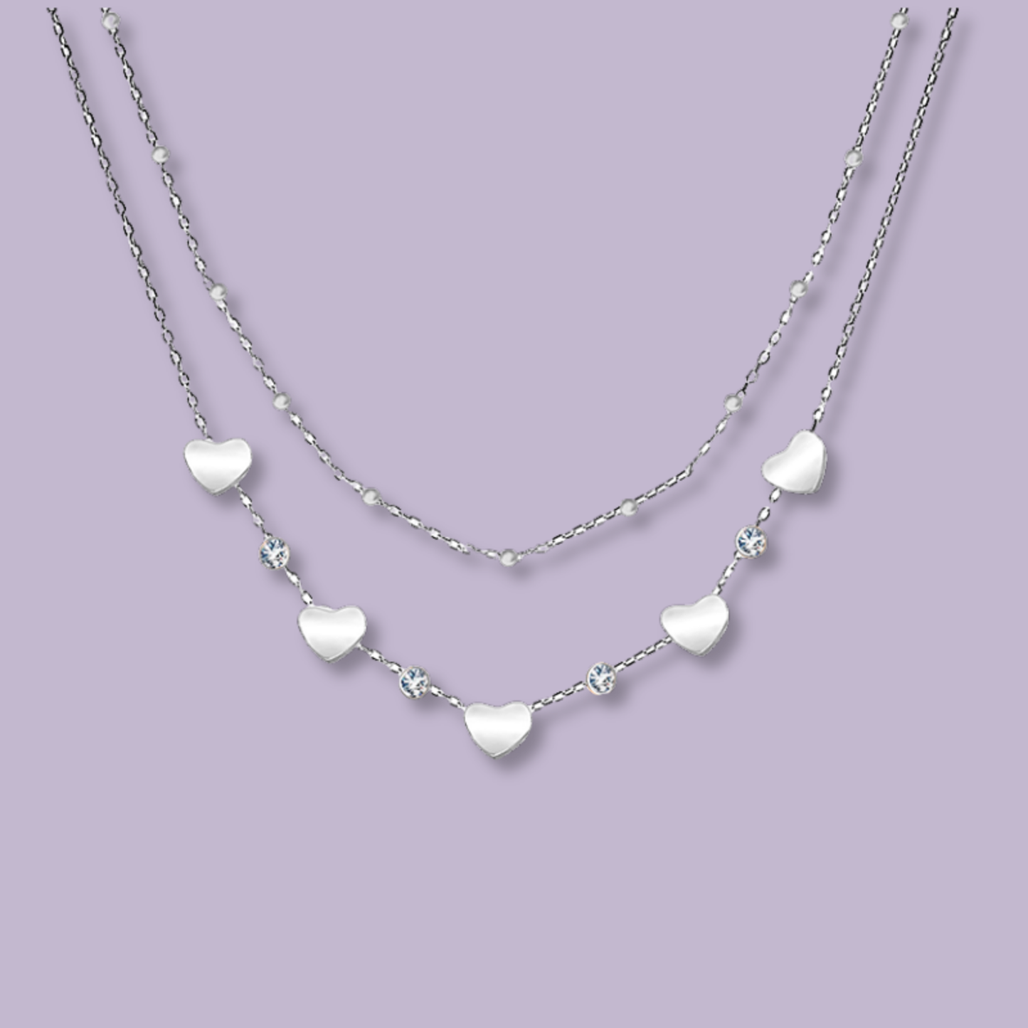 (C285)Collana 2 in 1 cuoricini + punto luce in acciaio inox