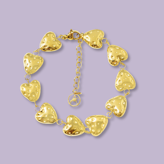 (B161)Bracciale cuori martellati in acciaio inox