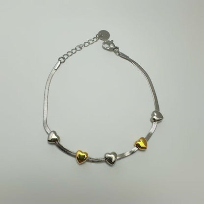 (B173)Bracciale cuoricini bicolori
