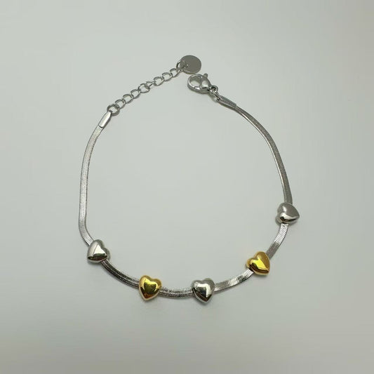 (B173)Bracciale cuoricini bicolori