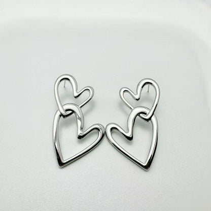 (O084)Orecchini doppio cuore in acciaio inox
