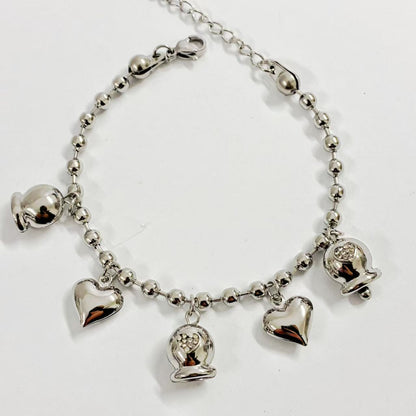 Bracciale “Cuori & Campanelli” – Dolcezza Brillante e Stile Romantico