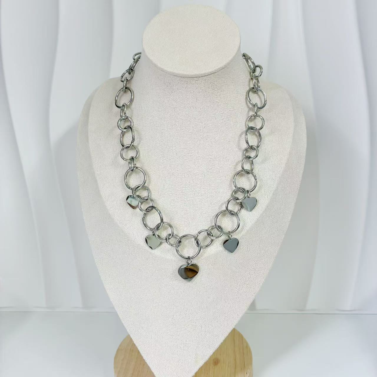 (C203)Collana cerchi più cuori in acciaio inox