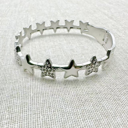 (B177)Bracciale rigido con la molla stelle chevalier
