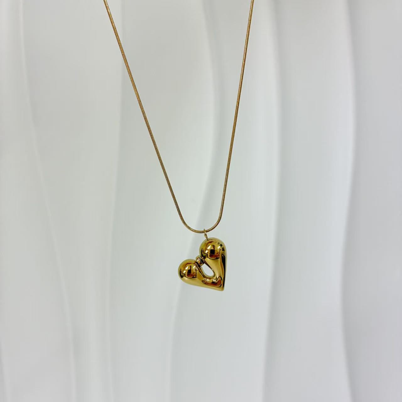 (C250)Collana cuore bombato piccolo in acciaio inox