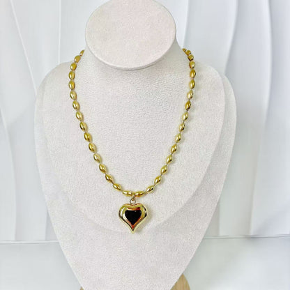 (C254)Collana con cuore bombato in acciaio inox