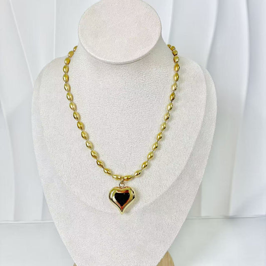 (C254)Collana con cuore bombato in acciaio inox