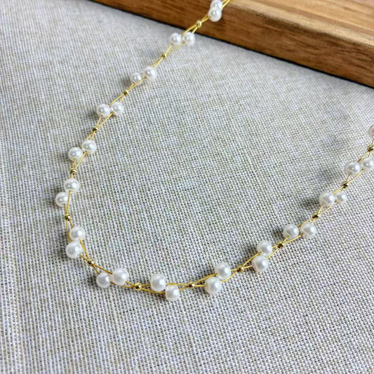 Collana “Perla Doppia” – Eleganza intrecciata