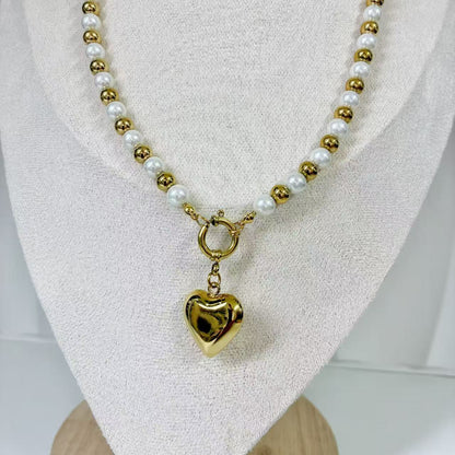 (C219)Collana bicolore con cuore bombato in acciaio inox