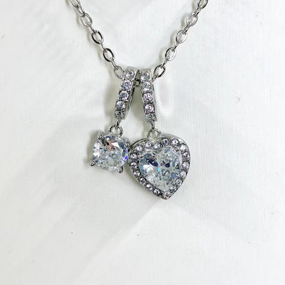 Collana “Cuori Gemelli” – Romantica Brillantezza con Doppio Pendente