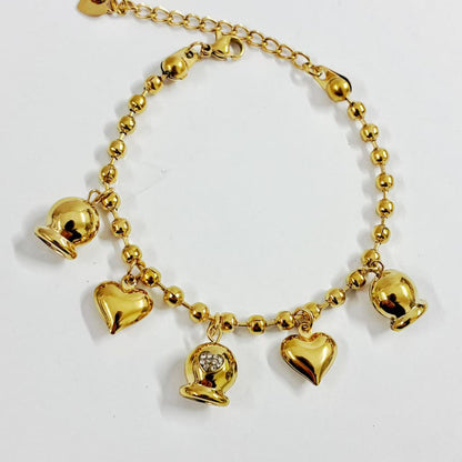 Bracciale “Cuori & Campanelli” – Dolcezza Brillante e Stile Romantico