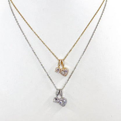 Collana “Cuori Gemelli” – Romantica Brillantezza con Doppio Pendente
