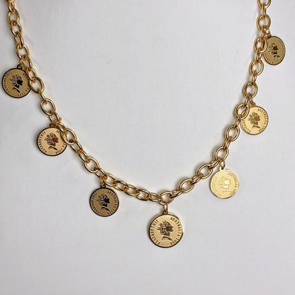 Collana “Monete Vintage” – Charme Retrò in Acciaio Moderno