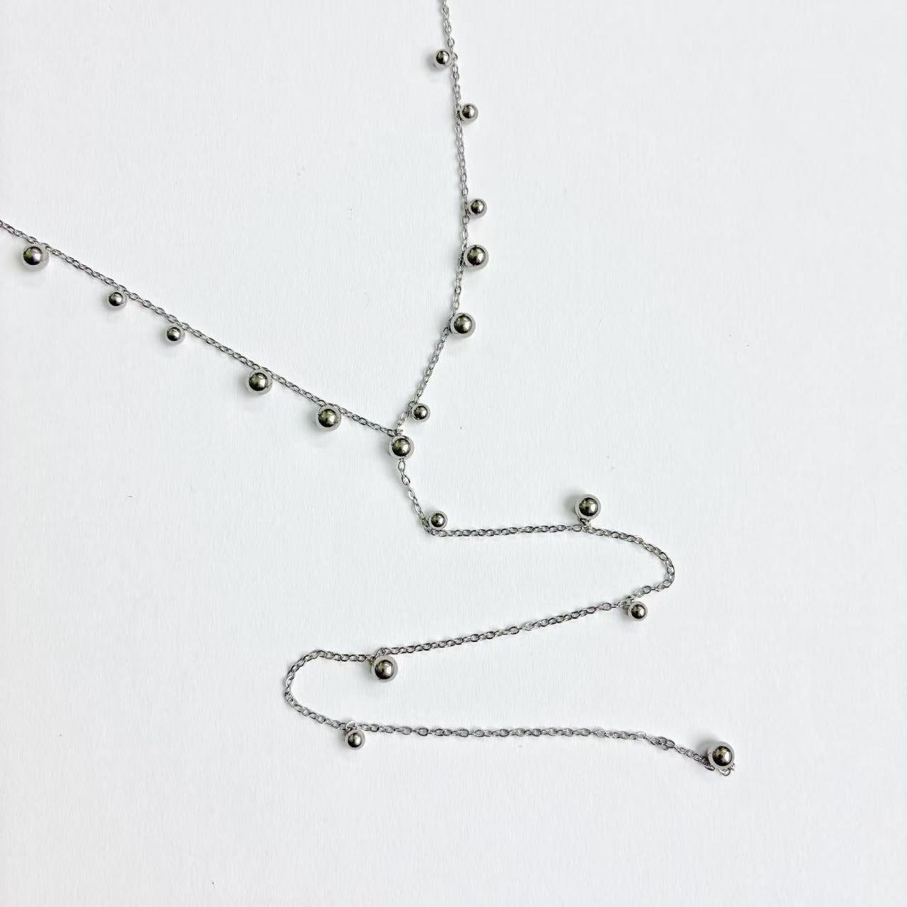 Collana palline con pendente lungo