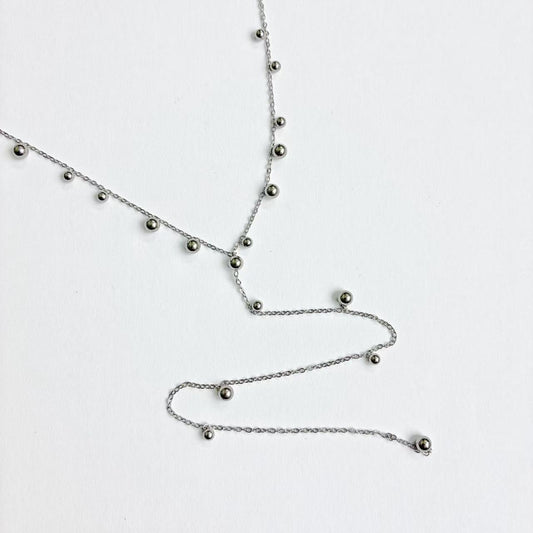 Collana palline con pendente lungo